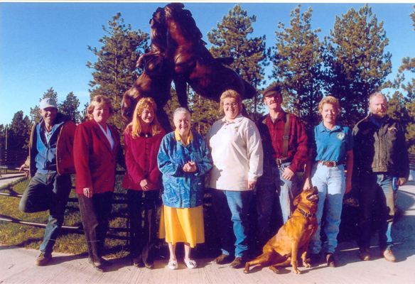 Ruth with the family in front of the Stallions sculpture